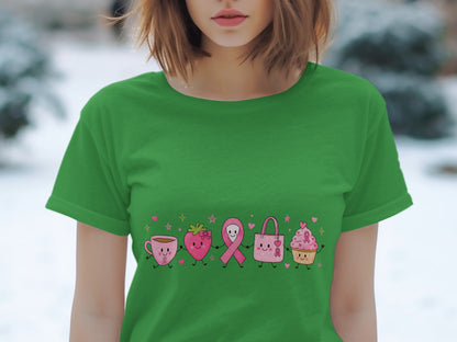 Green t-shirt with cartoon strawberry, pink ribbon, handbag, and cupcake figures.