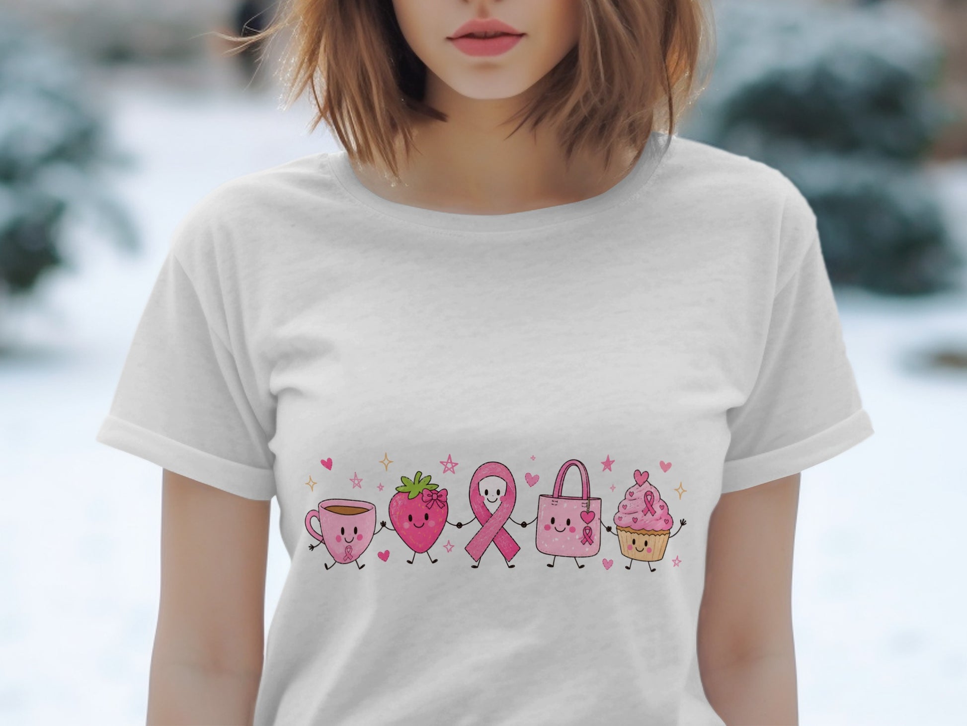 White t-shirt with a line of cute characters: coffee cup, strawberry, ribbon, purse, cupcake.