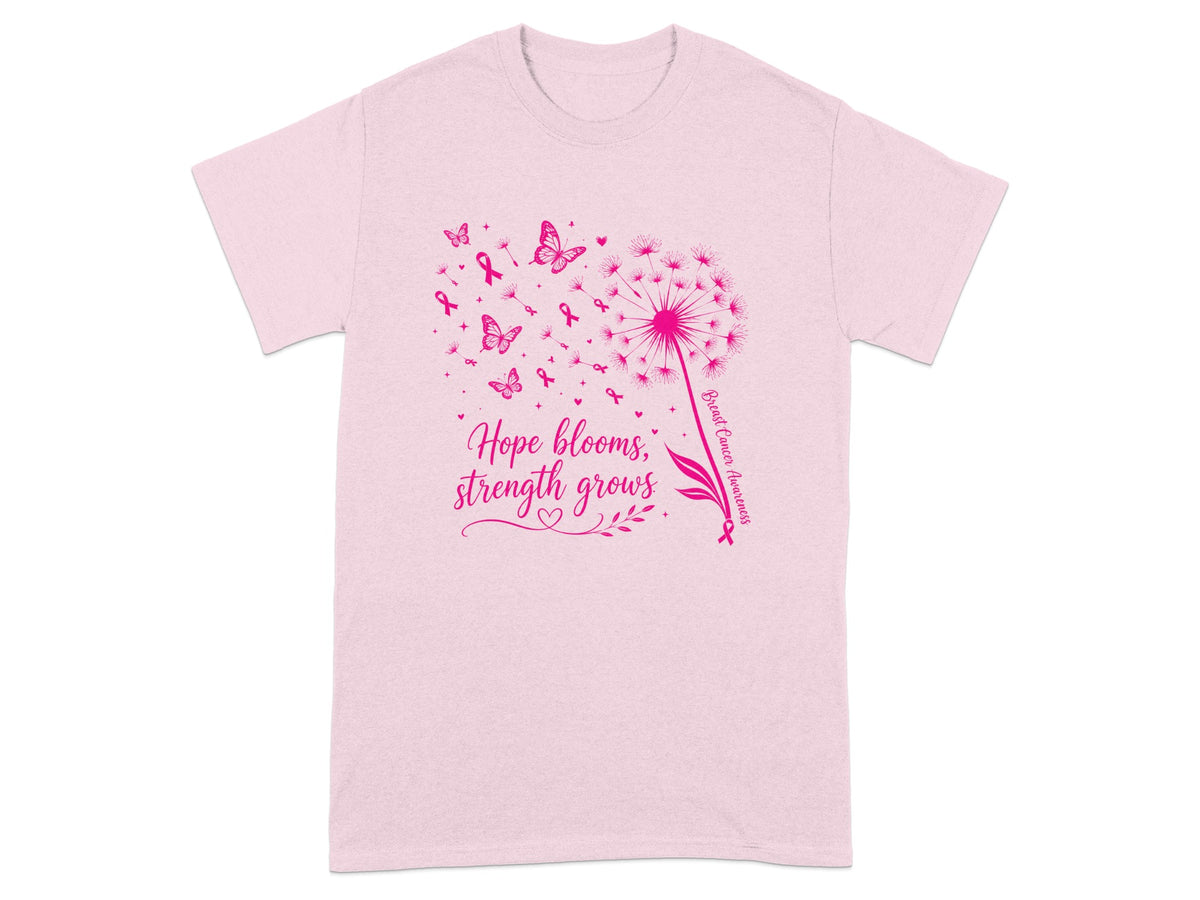 Pink t-shirt with a dandelion design, butterflies, ribbons, and text.
