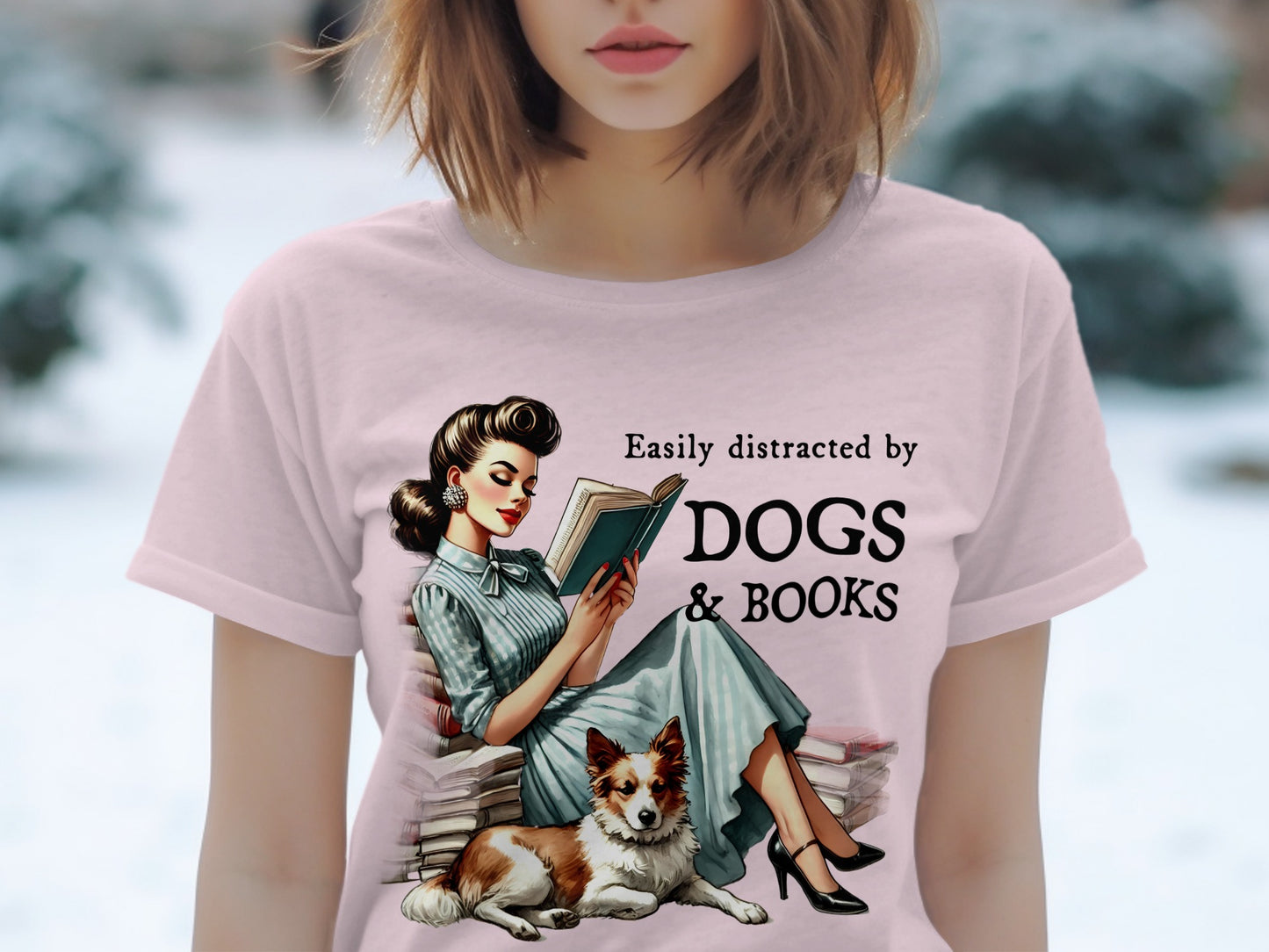 Woman reading books with dog, text "Easily distracted by DOGS & BOOKS".