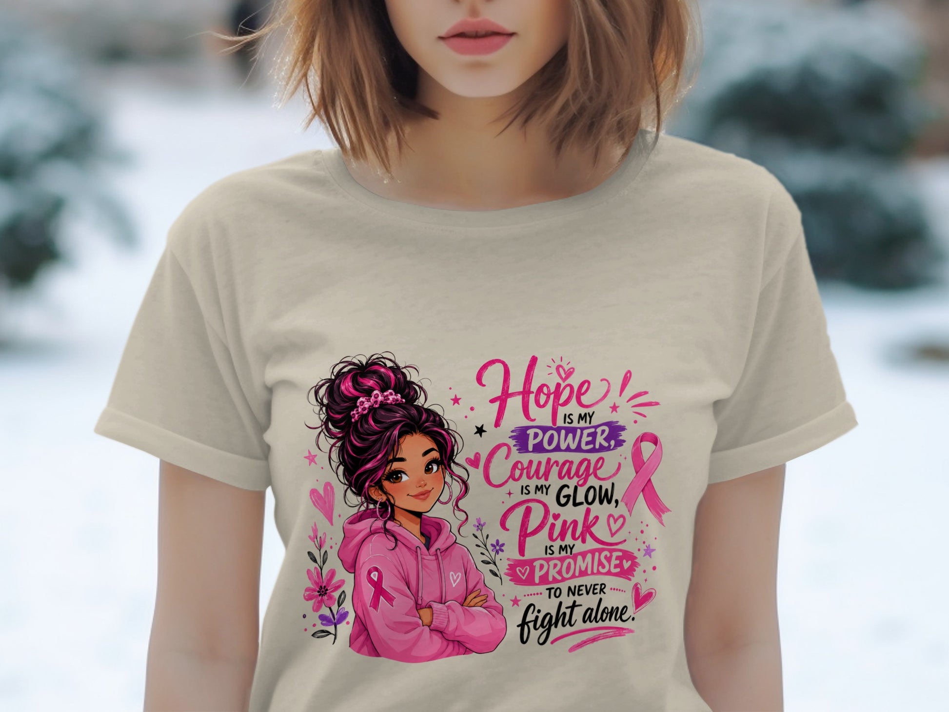 Girl with pink hoodie and text: Hope is my power, Courage is my glow, Pink is my promise to never fight alone.