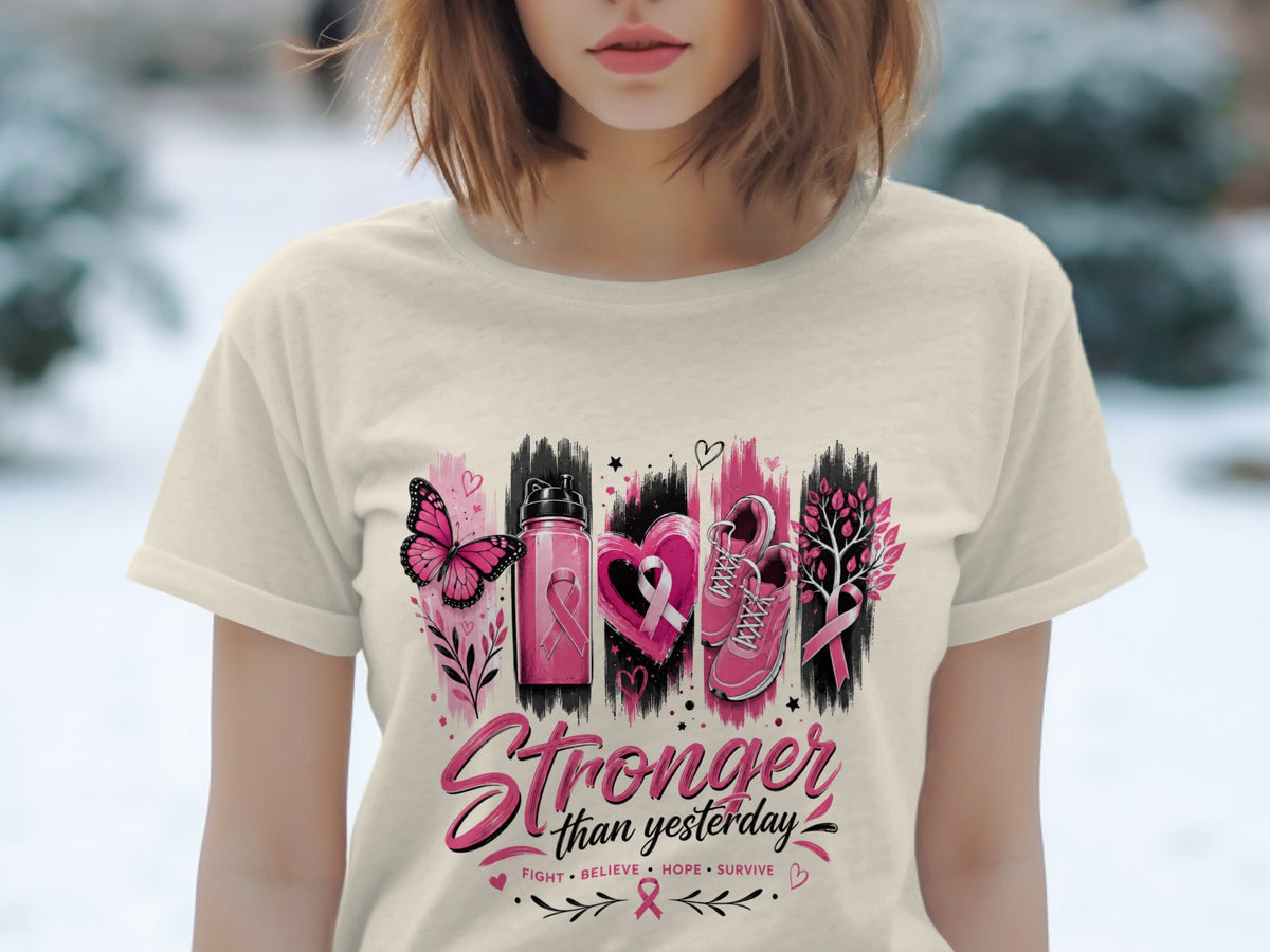 T-shirt graphic with butterfly, water bottle, heart, sneakers, tree, and text "Stronger than yesterday".