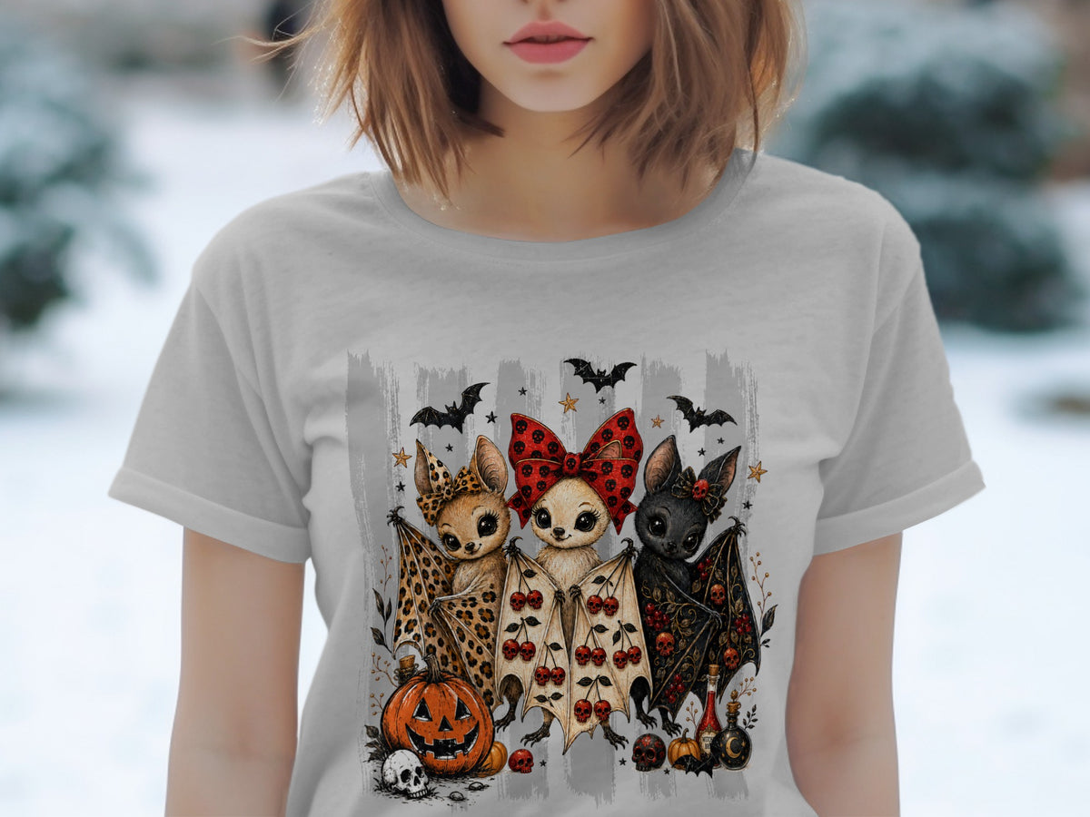 Three cartoon bats with Halloween decorations and a jack-o'-lantern.