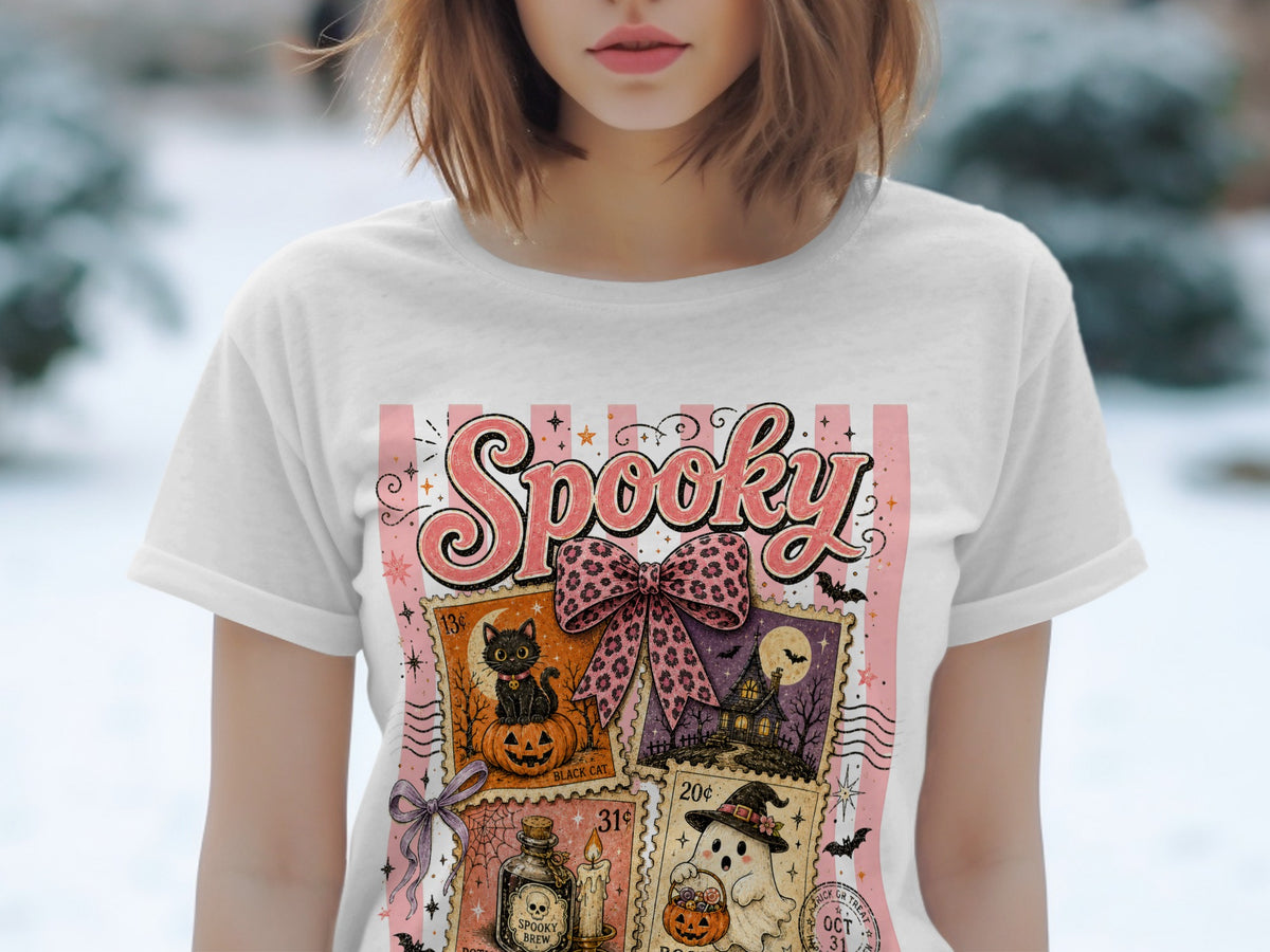 White t-shirt with a "Spooky" graphic featuring four Halloween-themed stamps.