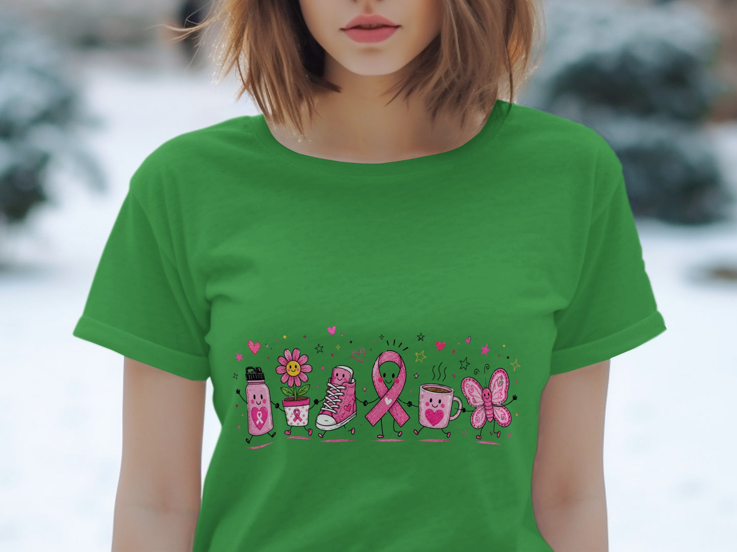 Green t-shirt with a row of cartoon breast cancer awareness symbols holding hands.
