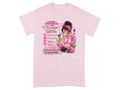 Pink t-shirt with "I am stronger than what it tried to take" text and warrior graphic.