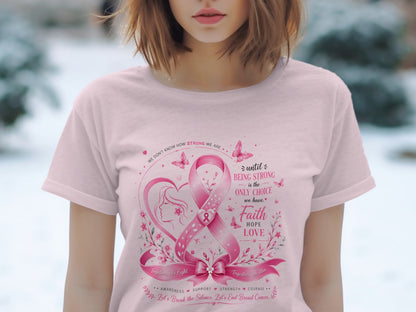 Pink t-shirt with breast cancer ribbon, heart, butterflies, and empowering text.