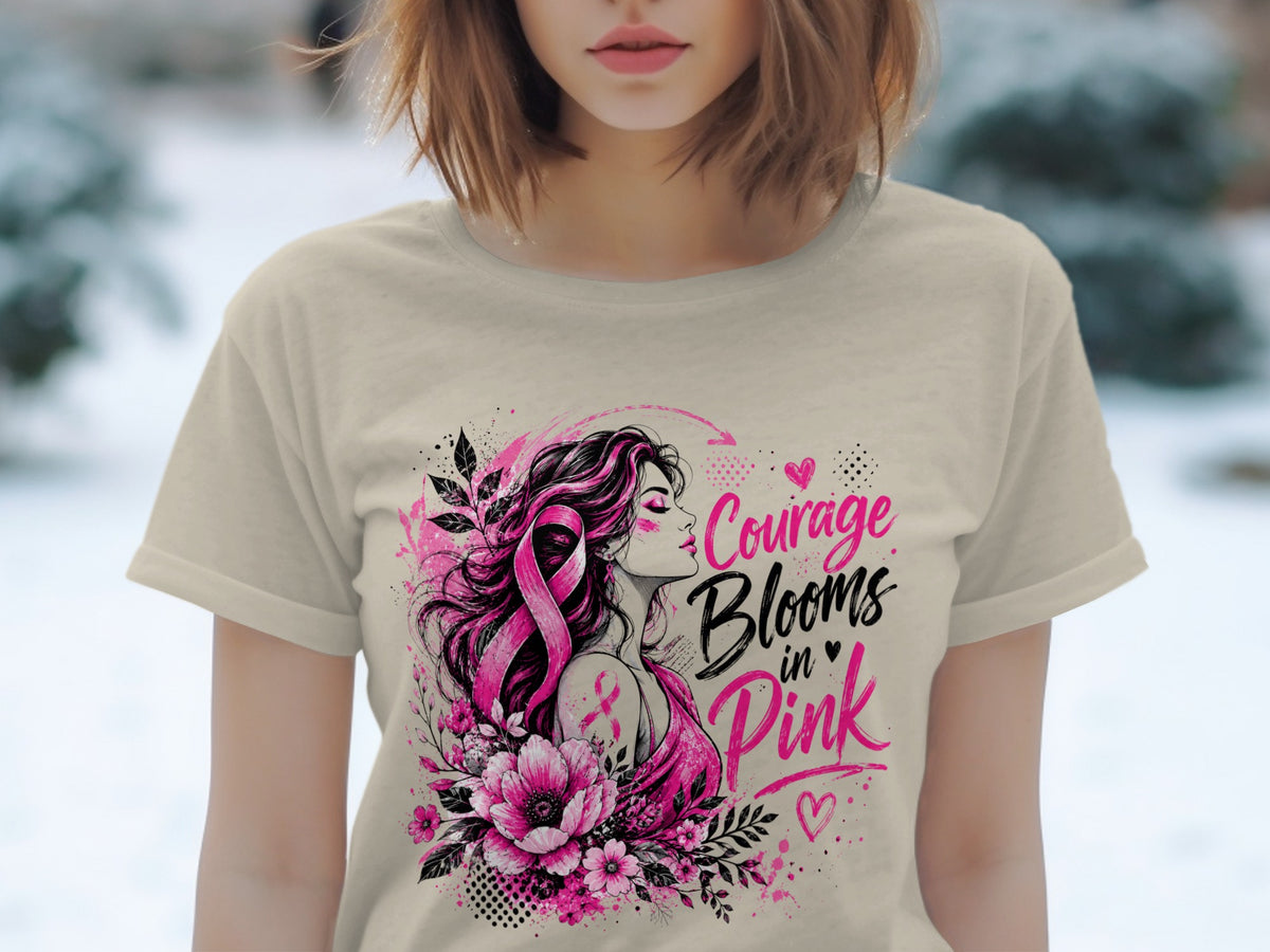 T-shirt graphic with woman, pink ribbon, flowers, and text "Courage Blooms in Pink".