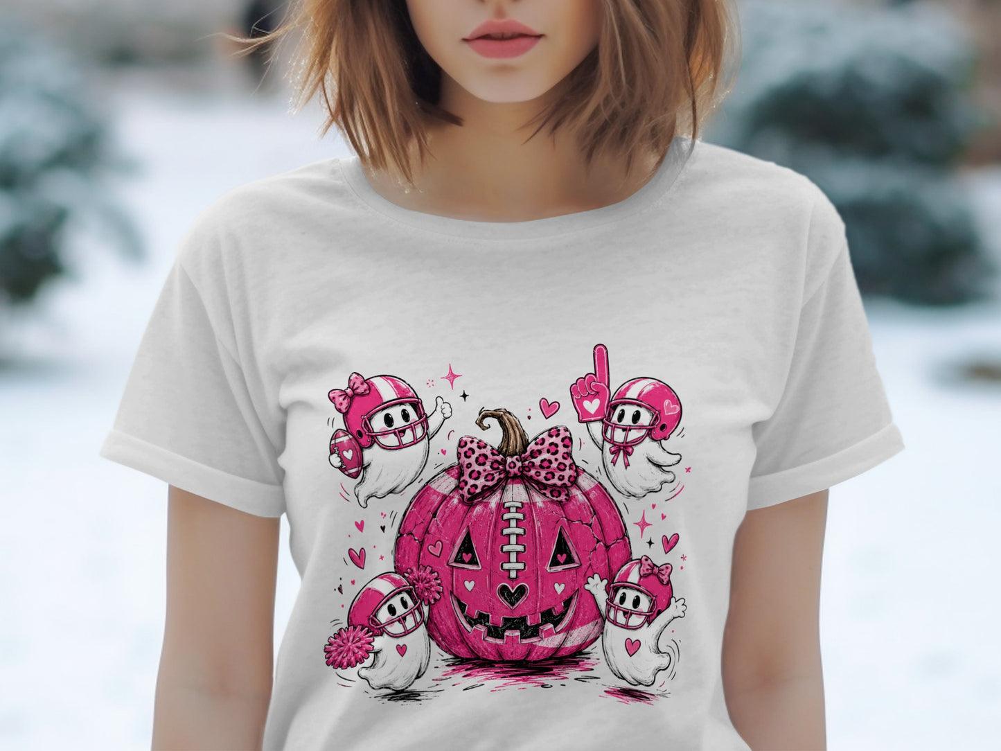 Pink pumpkin with football player ghosts wearing helmets, one holding a football.