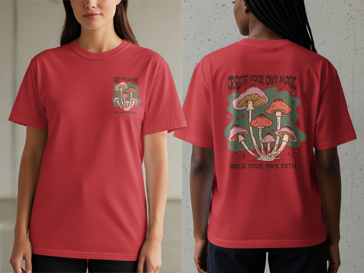 Red t-shirt with mushrooms and text "CREATE YOUR OWN MAGIC" and "WALK YOUR OWN PATH".