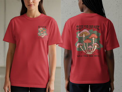 Red t-shirt with mushrooms and text "CREATE YOUR OWN MAGIC" and "WALK YOUR OWN PATH".