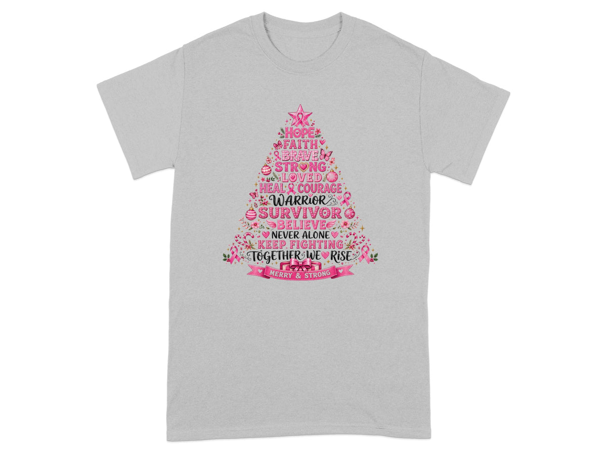 Grey t-shirt with a pink Christmas tree graphic featuring words like Hope, Warrior, Survivor, and Merry & Strong.