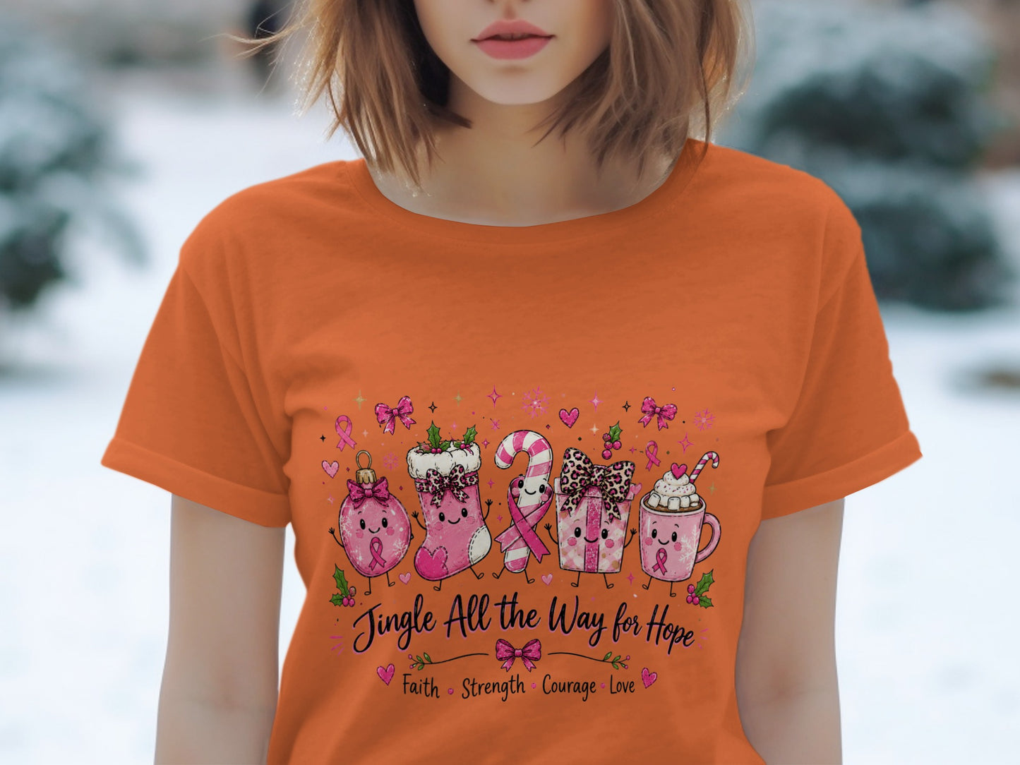 Orange t-shirt with festive Christmas characters and "Jingle All the Way for Hope" text.