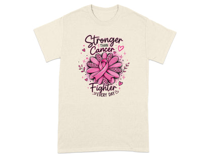 Cream t-shirt with "Stronger than Cancer, Fighter Every Day" text and pink ribbon.
