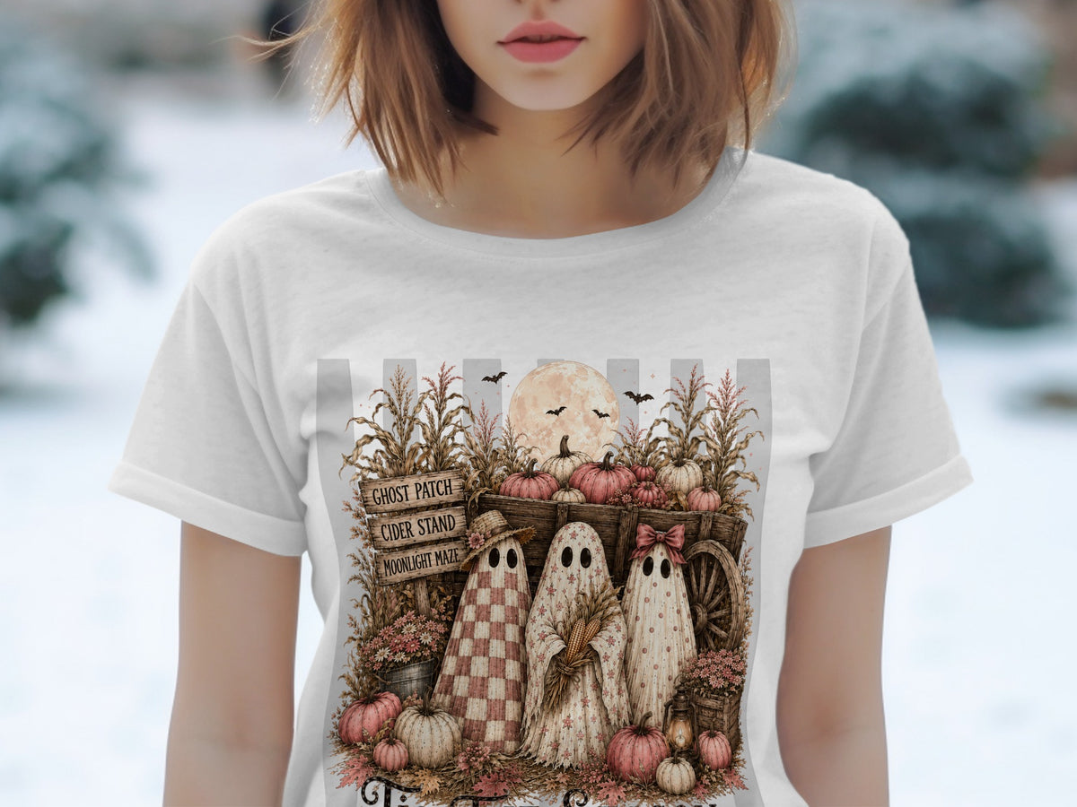 Three ghosts stand before a wagon with pumpkins, corn stalks, and a sign reading "Ghost Patch Cider Stand Moonlight Maze."