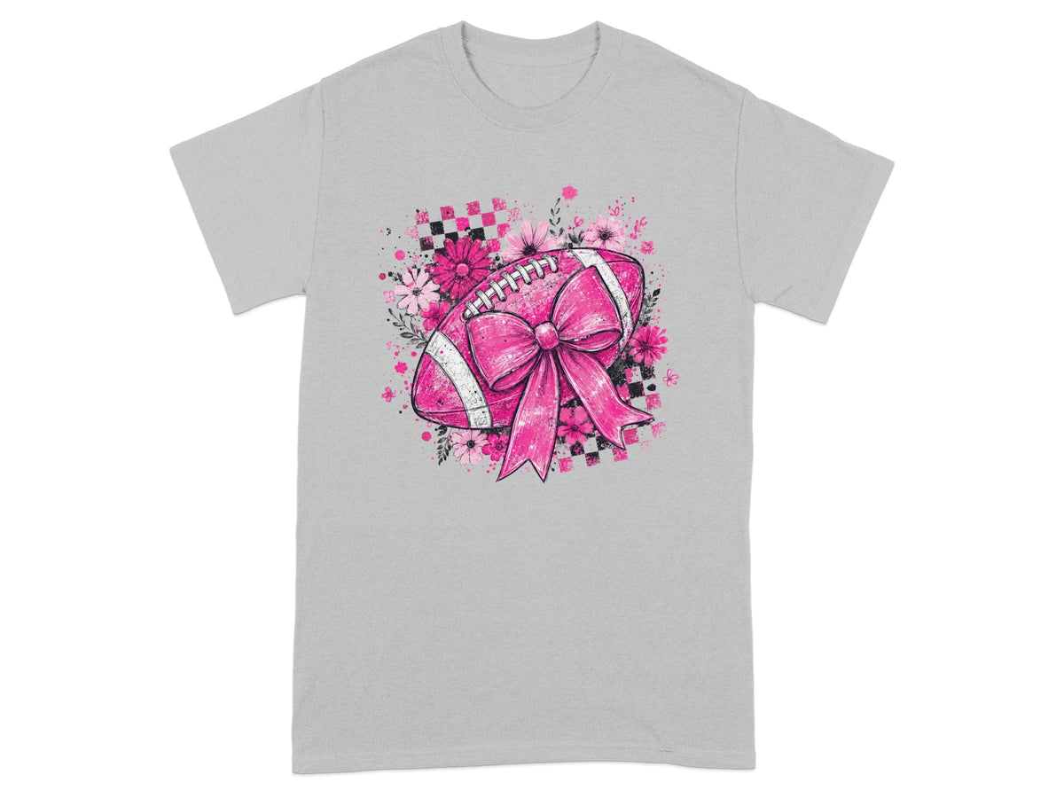 Pink football with a bow and floral design on a gray t-shirt.