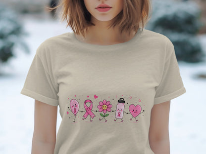 Pink balloon, ribbon, flower, water bottle, and heart graphic on a light beige t-shirt.