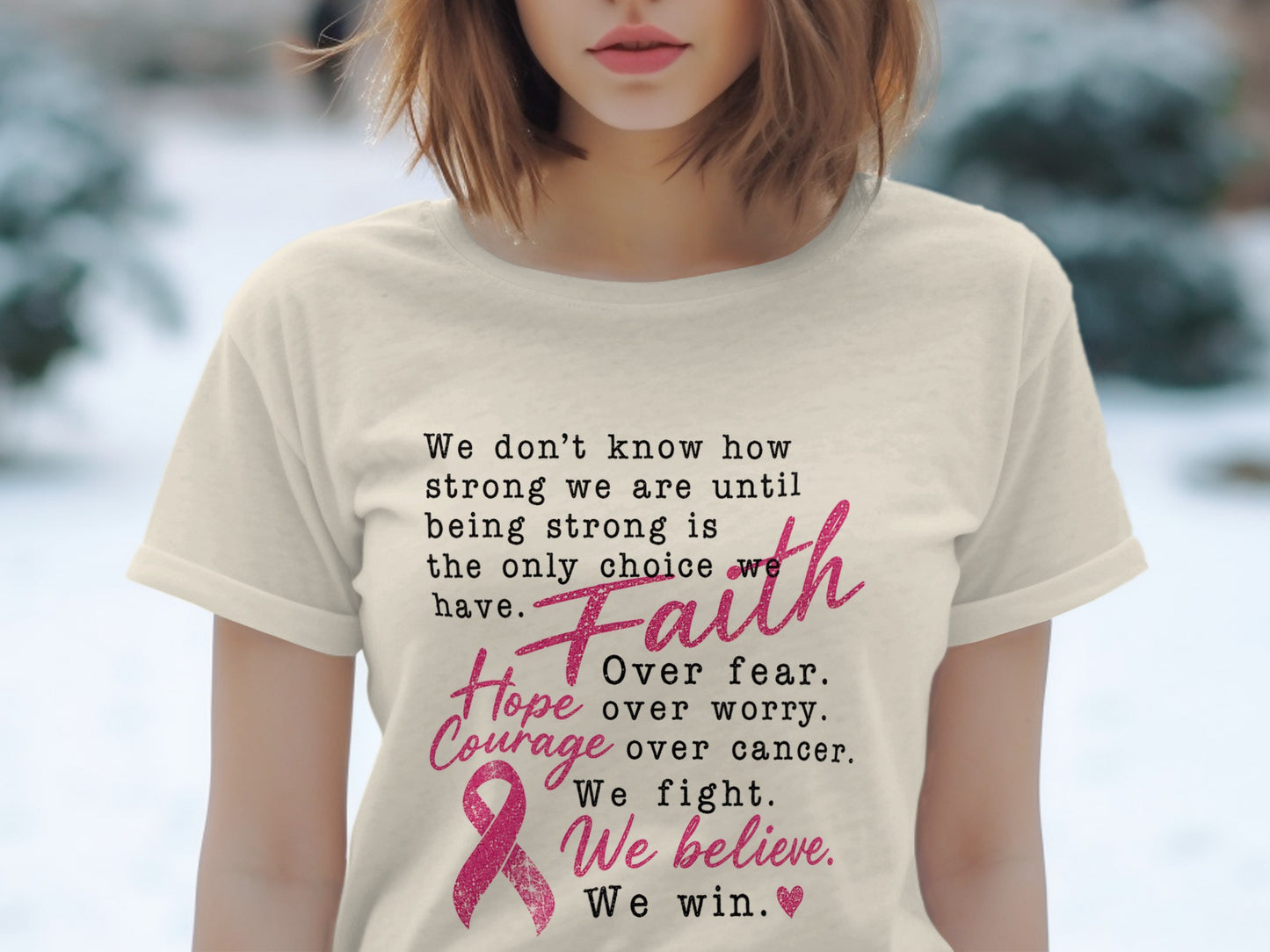 Cream t-shirt with text: "Faith Over fear. Hope Over worry. Courage Over cancer. We fight. We believe. We win."
