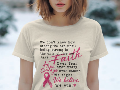 Cream t-shirt with text: "Faith Over fear. Hope Over worry. Courage Over cancer. We fight. We believe. We win."
