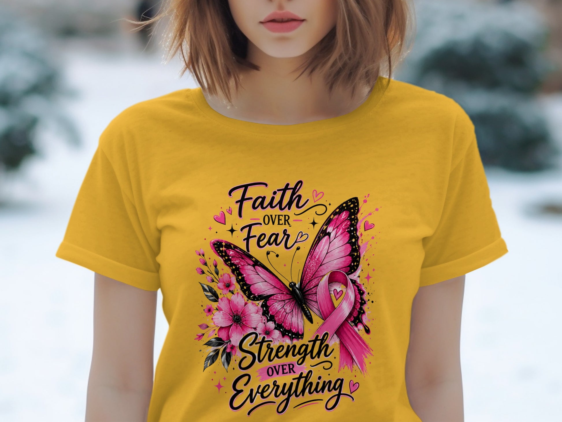 Yellow t-shirt with butterfly, flowers, and text "Faith over Fear, Strength over Everything".