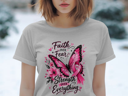 Grey t-shirt with pink butterfly, flowers, and "Faith over Fear, Strength over Everything" text.
