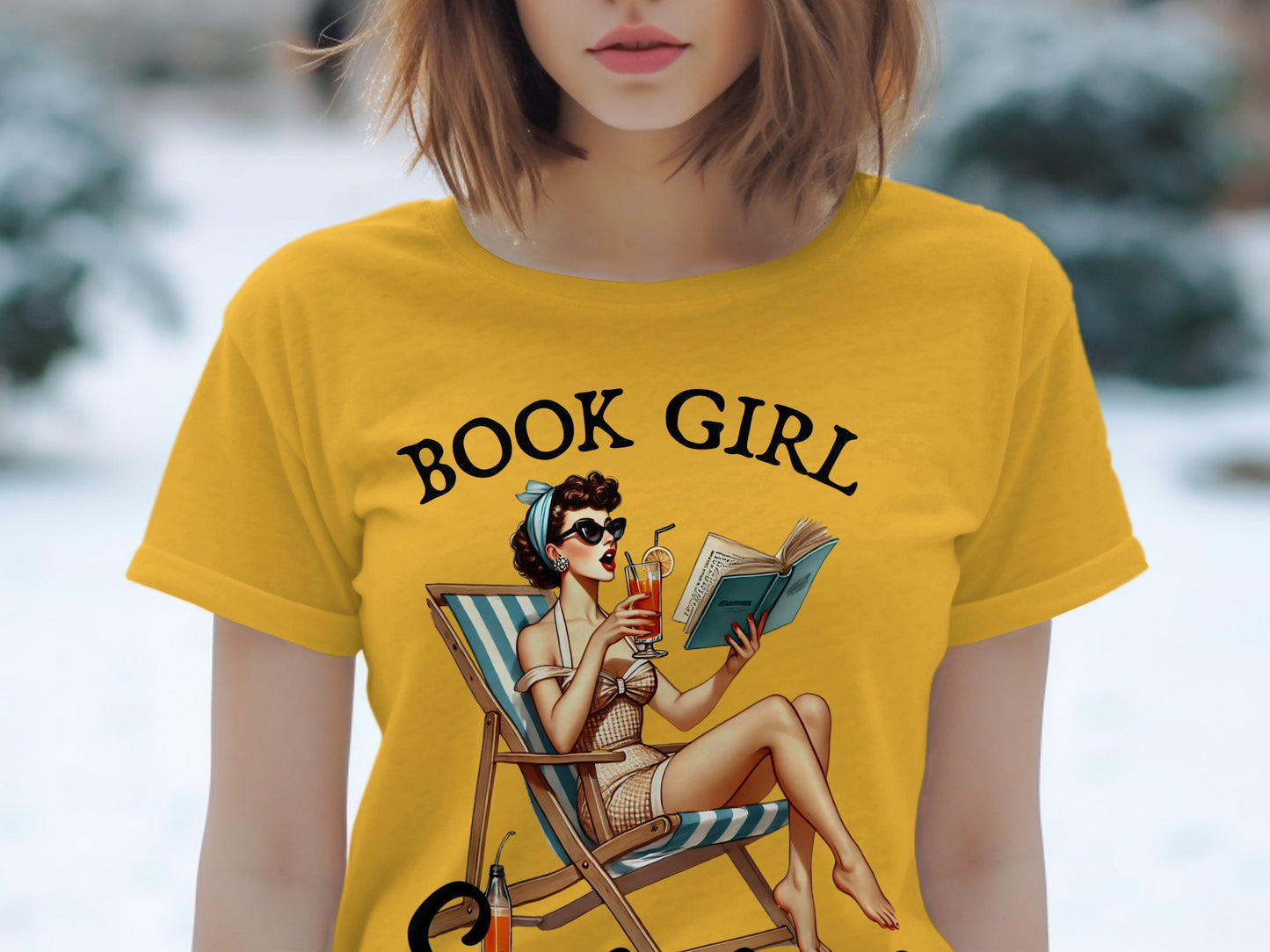 Yellow t-shirt with "BOOK GIRL" text and pin-up style illustration of a woman reading.