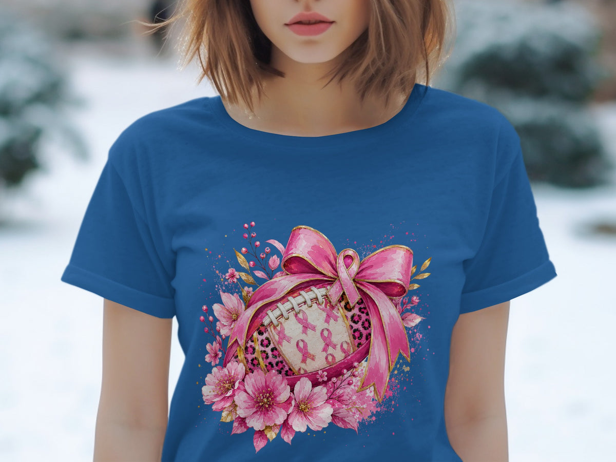 Football adorned with pink ribbons and flowers, tied with a pink bow.