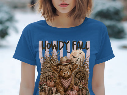Highland cow wearing hat and bandana with "Howdy Fall" text and Halloween decor.