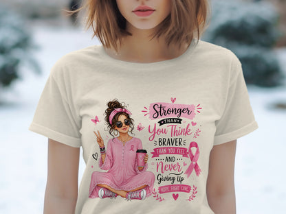 Pink ribbon graphic with inspirational text "Stronger Than You Think, Braver Than You Feel, And Never Giving Up."