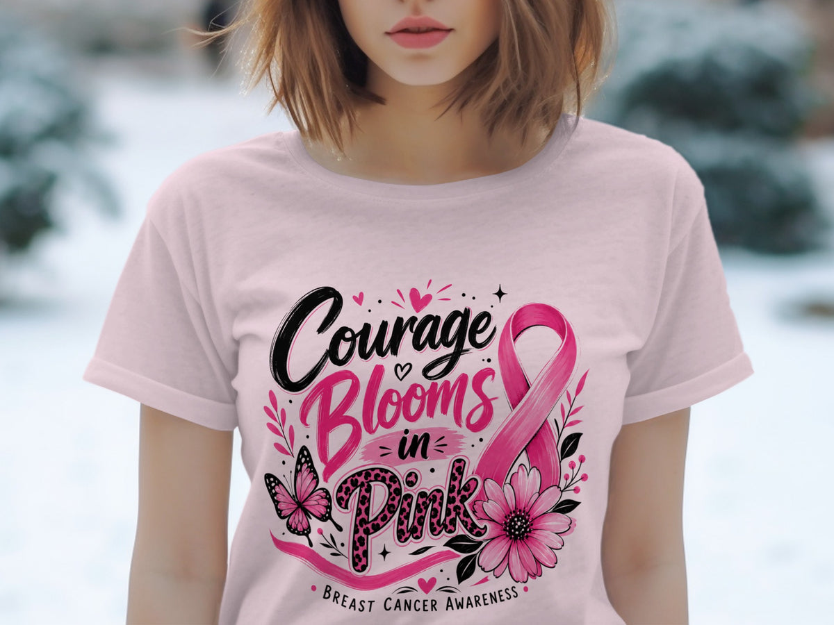 Pink t-shirt with "Courage Blooms in Pink" and breast cancer awareness ribbon design.