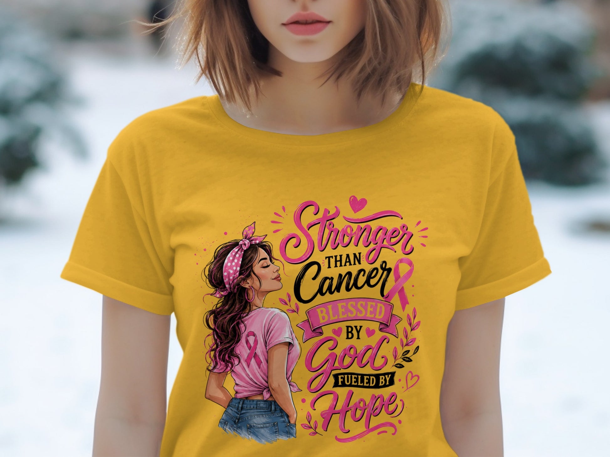 Yellow t-shirt with graphic reading "Stronger Than Cancer Blessed By God Fueled By Hope."