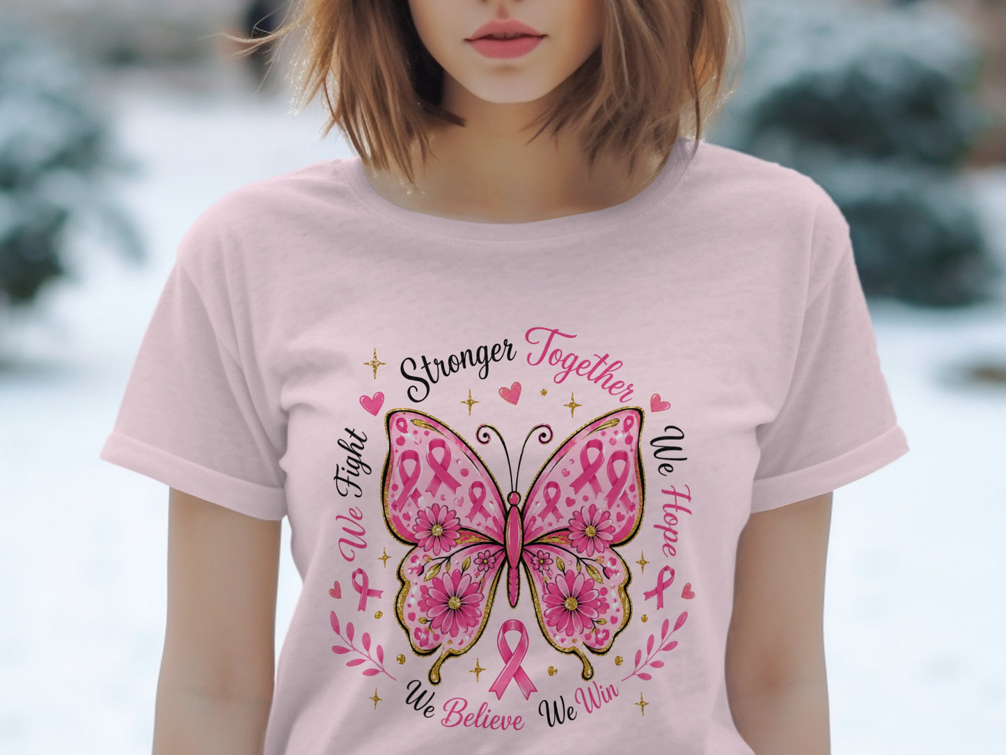 Pink t-shirt with butterfly design featuring "Stronger Together," "We Fight," "We Hope," and "We Believe We Win."
