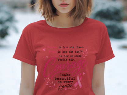 Red t-shirt with the text "Brave is how she rises. Hope is how she heals. Love is how we stand beside her. Courage looks beautiful on every fighter."