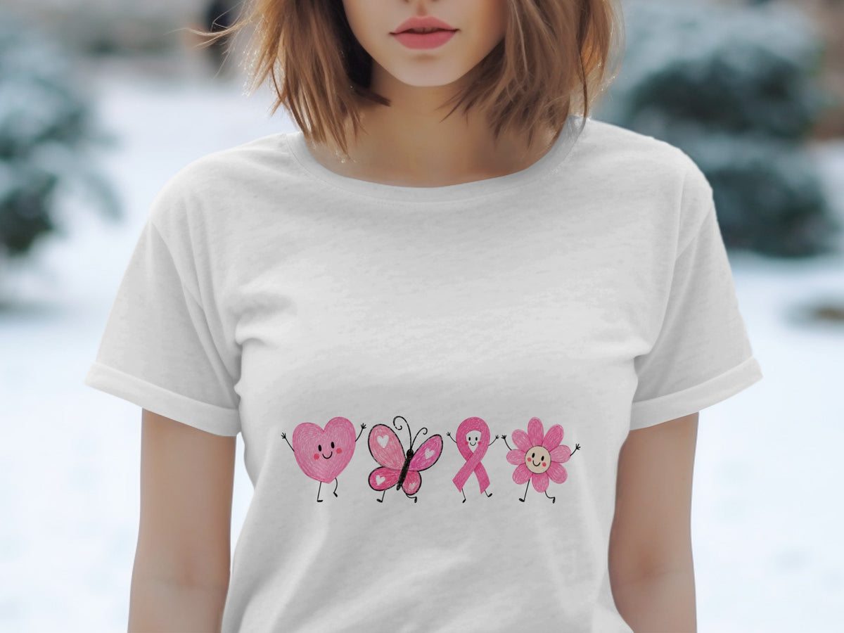 White t-shirt with pink cartoon heart, butterfly, ribbon, and flower characters.