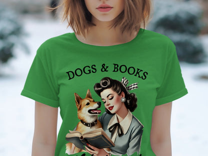 Green t-shirt with illustration of woman and dog reading a book. DOGS & BOOKS text.