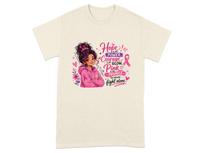 T-shirt with pink ribbon, illustration, and text "Hope is my power, courage is my glow, pink is my promise to never fight alone."