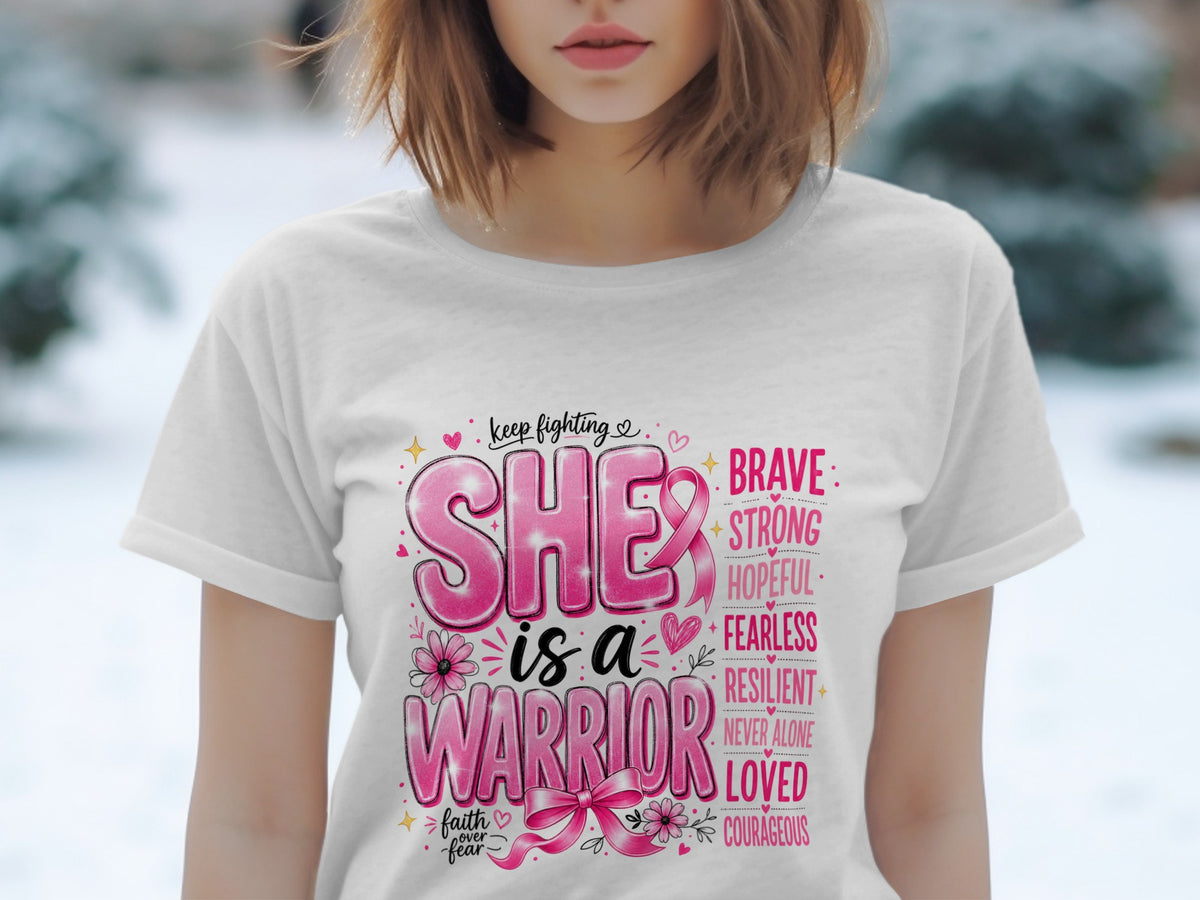 White t-shirt with "SHE IS A WARRIOR" text and inspirational words.