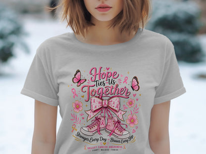 Gray t-shirt with "Hope Ties Us Together" design featuring pink sneakers, butterflies, and flowers.