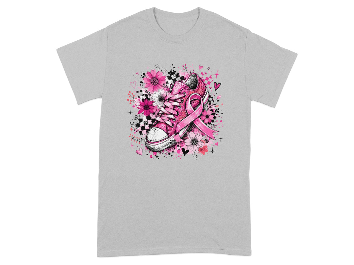 Pink sneaker with a breast cancer ribbon and floral accents on a gray t-shirt.