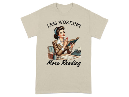 Shirt graphic with "Less Working More Reading" text and retro woman reading a book.