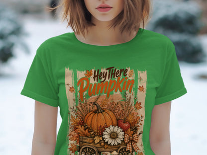 Green t-shirt with "Hey There Pumpkin" text and fall harvest graphic.