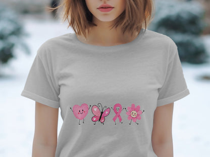 Gray t-shirt with cartoon pink heart, butterfly, ribbon, and flower graphic.