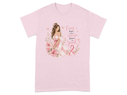 Pink t-shirt with woman, flowers, butterflies, and text "Carry hope, wear courage, bloom in pink".