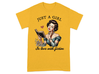 Yellow t-shirt with "Just a girl in love with fiction" text and illustration.