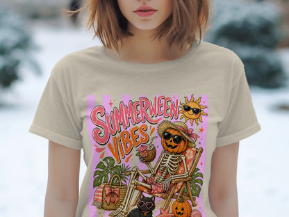 Skeleton with pumpkin head and sunglasses relaxing with a drink, text "Summerween Vibes".