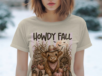 Highland cow in cowboy hat with "HOWDY FALL" text and Halloween elements.