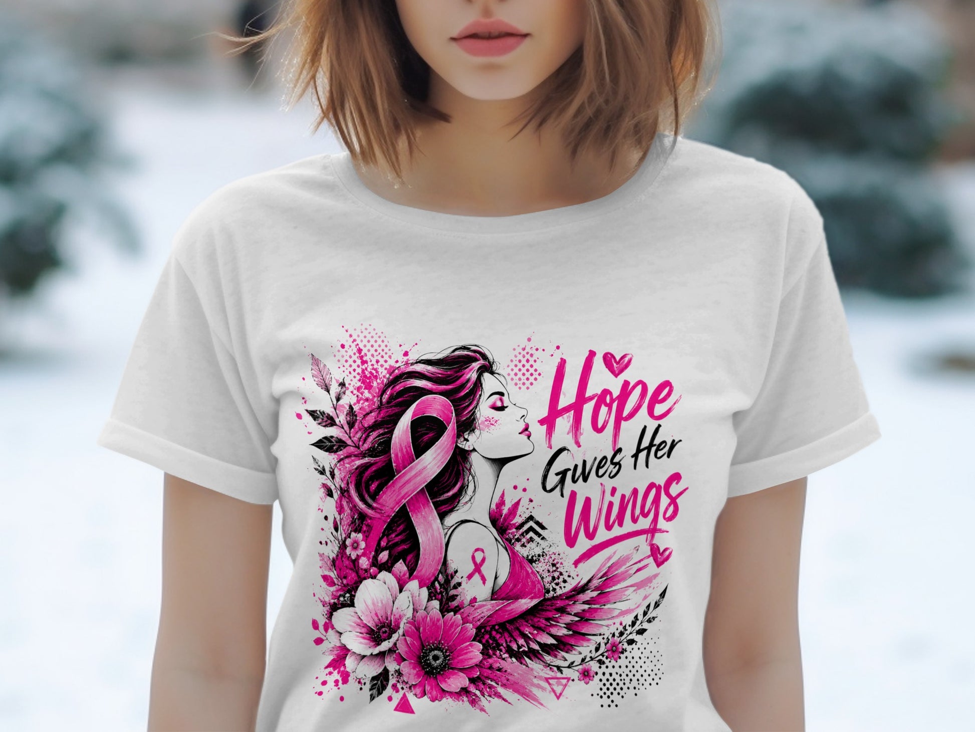 White t-shirt with pink breast cancer ribbon art and the text "Hope Gives Her Wings".