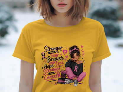 Yellow t-shirt with illustration: "Stronger than Fear, Braver than Hope, Stronger than Cancer"