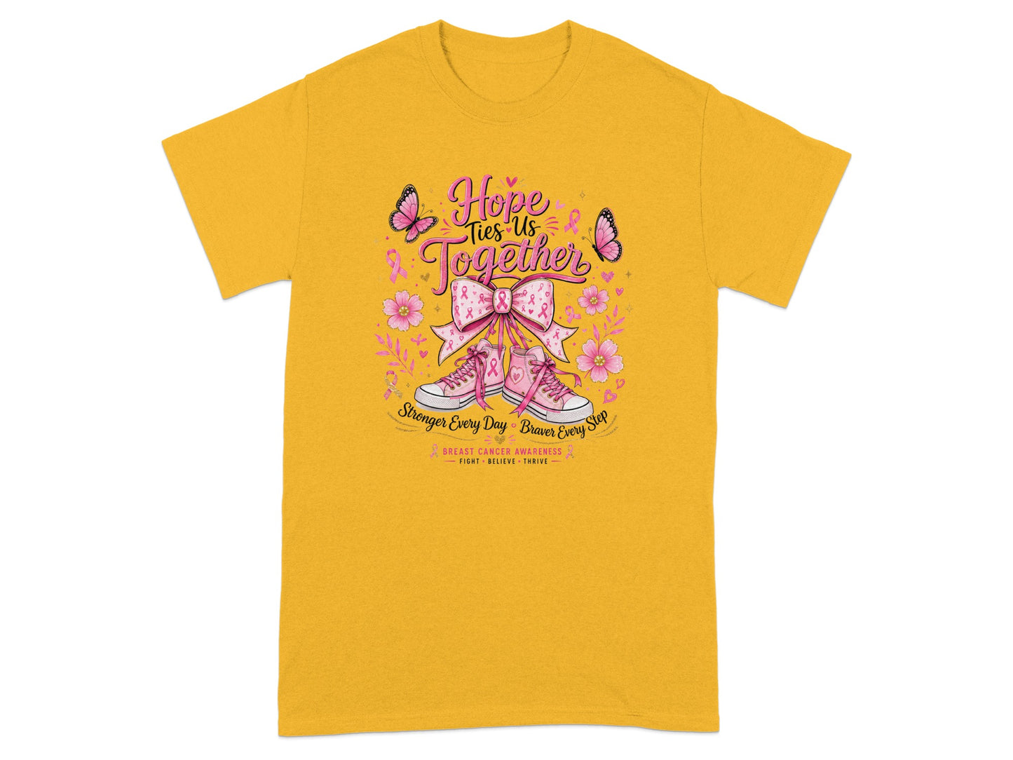 Yellow t-shirt with "Hope Ties Us Together" and breast cancer awareness graphics.