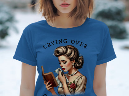 T-shirt with retro woman crying over book, text "CRYING OVER".